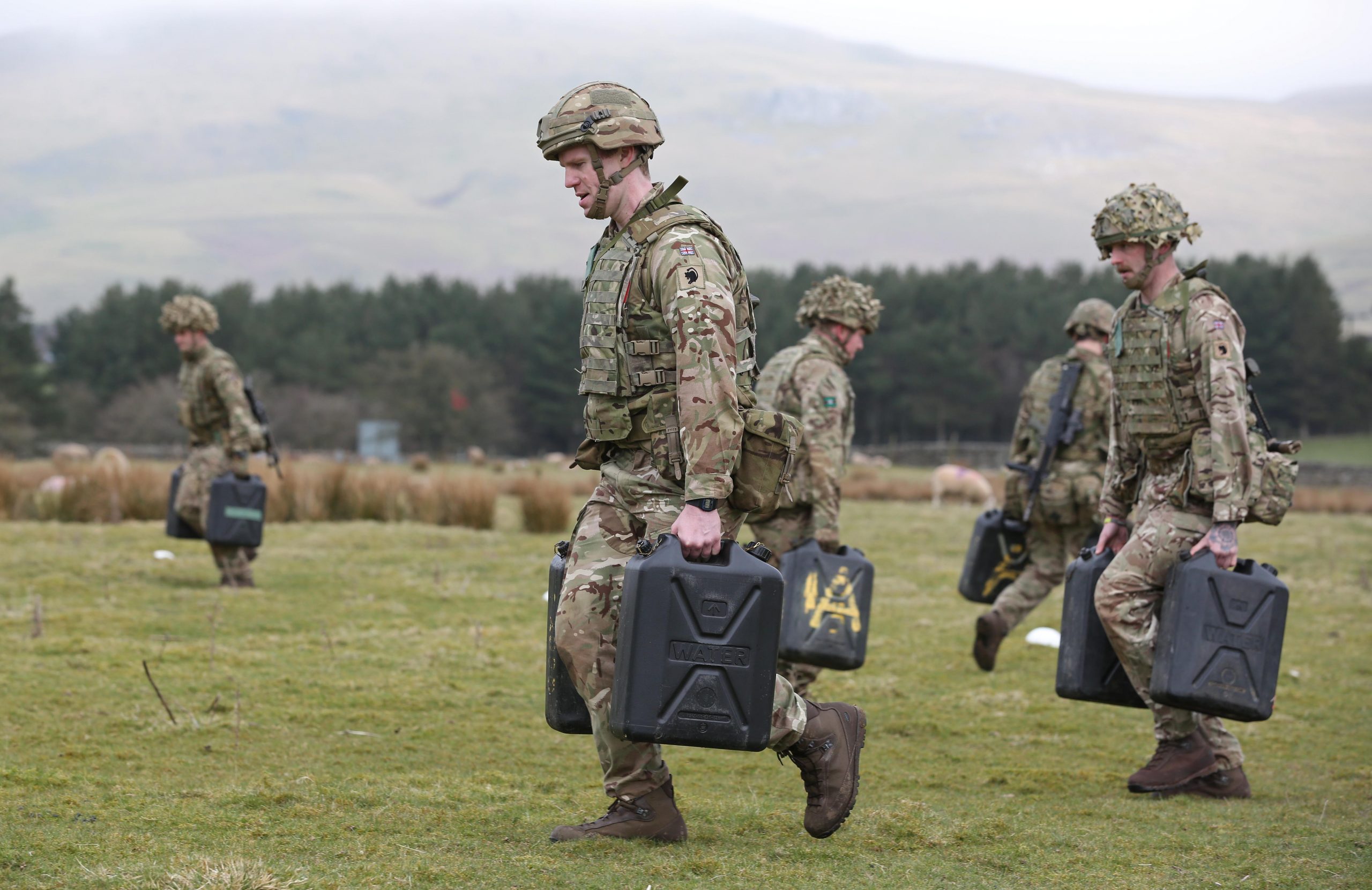 Reservist Adam McKenna, jerry can carr