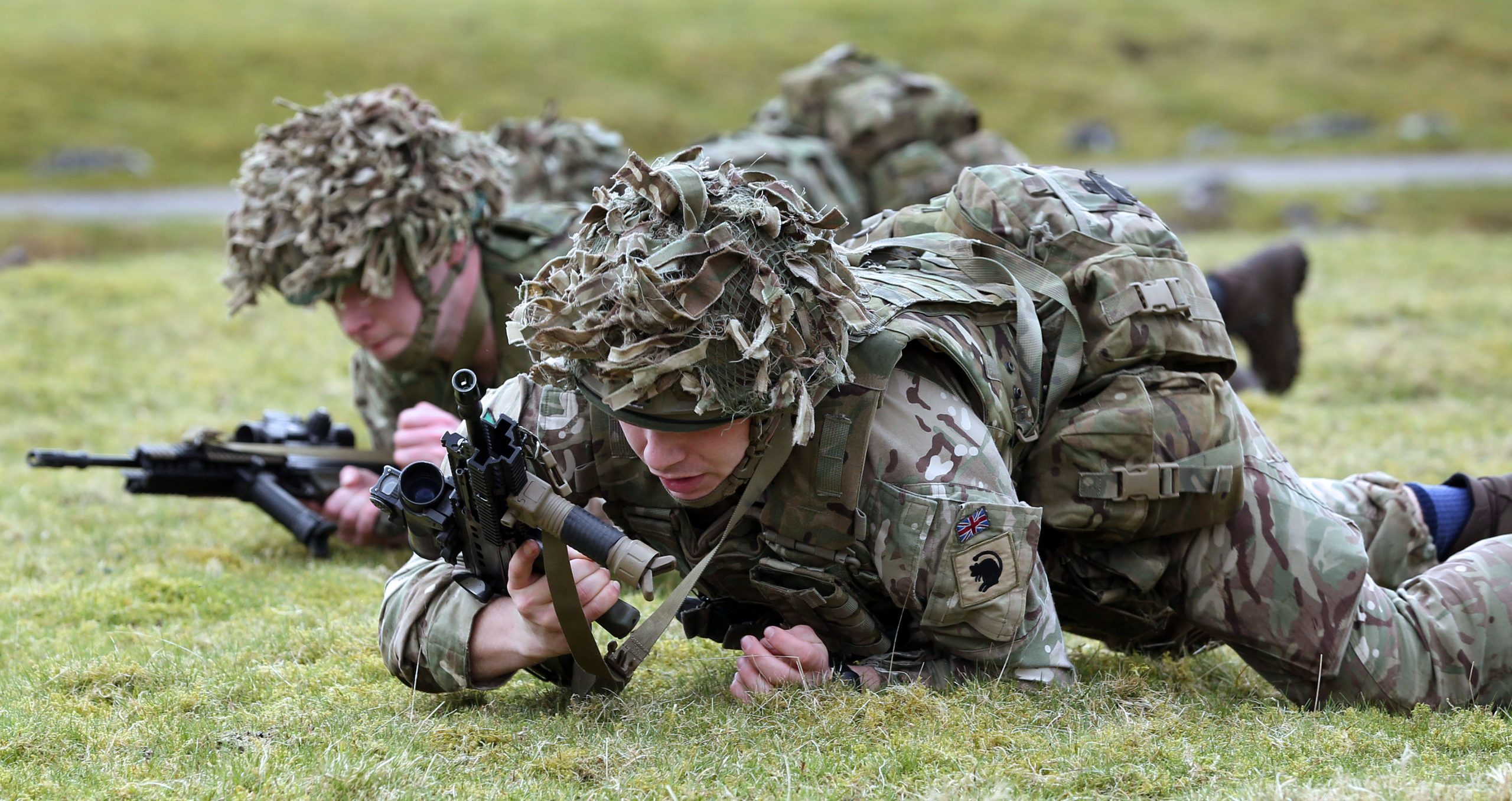 Reservist Matthew Neal practices fire and movement