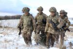 Jordan Morrison and Timothy Lambert leading a stretcher bearing party at Warcop Training Area