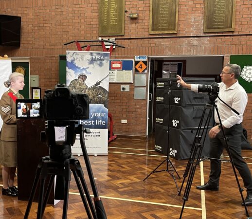 Cadet being filmed by man