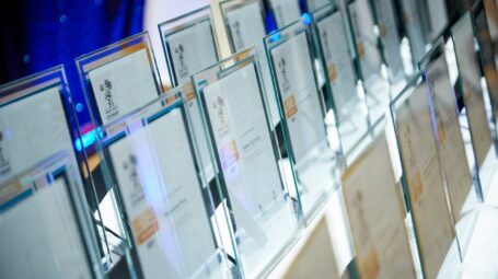 A row of framed certificates